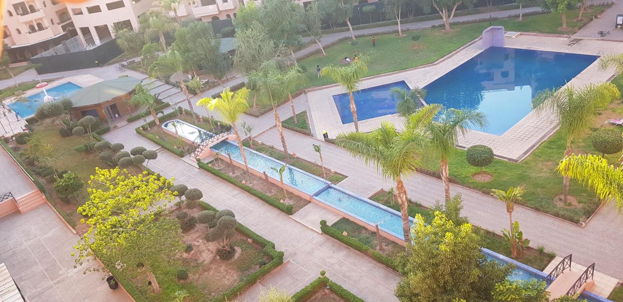 Un Moderne Chic Appartement Vue Sur Piscine Marrakesch Exterior foto