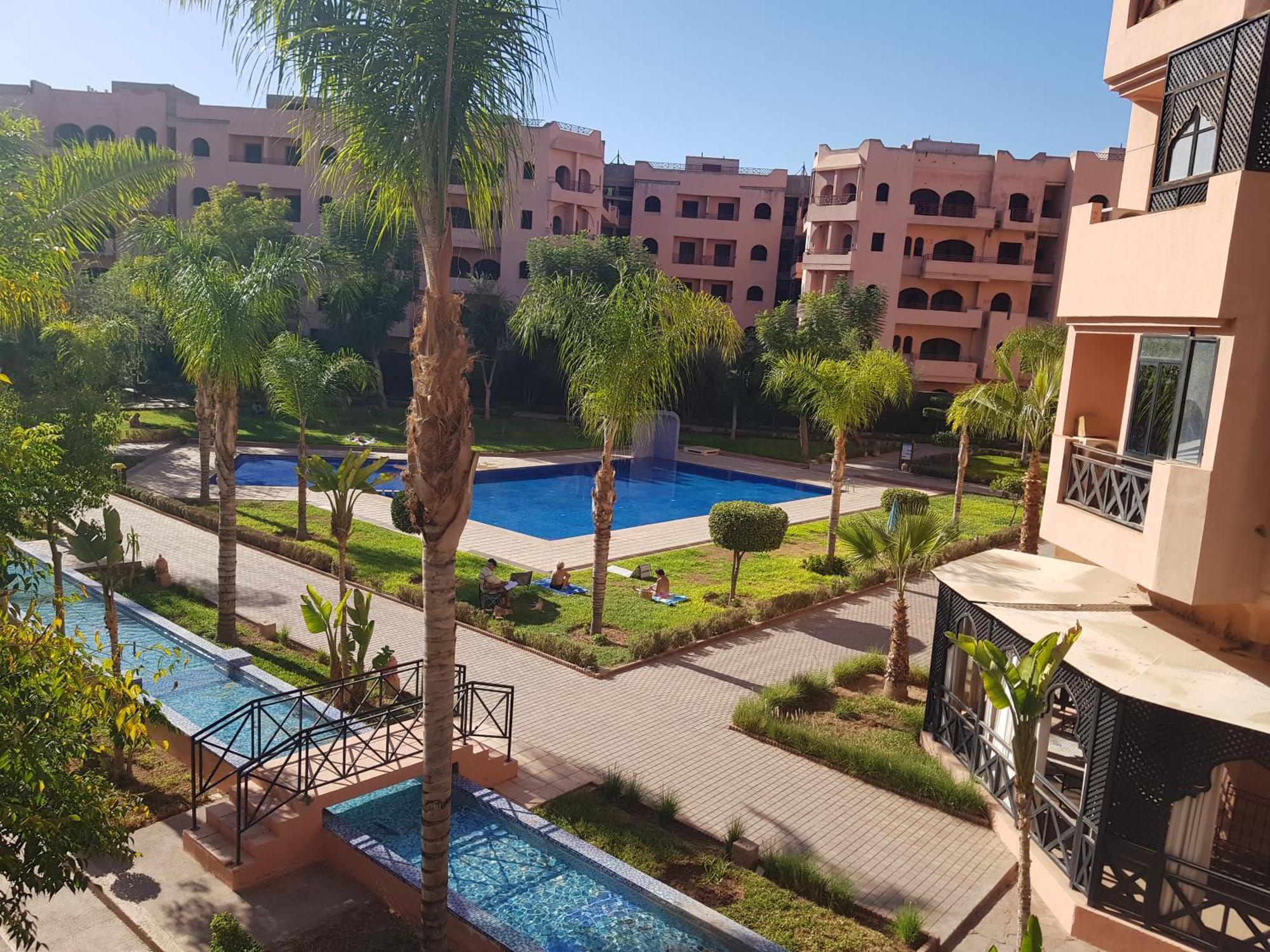 Un Moderne Chic Appartement Vue Sur Piscine Marrakesch Exterior foto