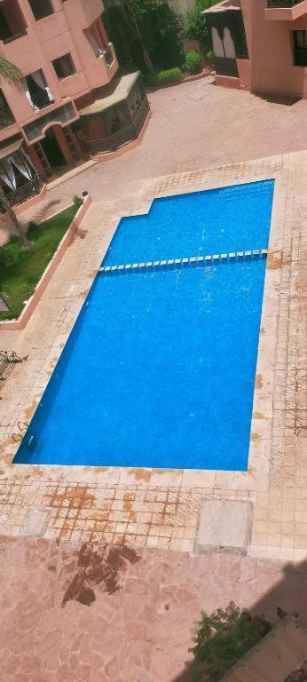 Un Moderne Chic Appartement Vue Sur Piscine Marrakesch Exterior foto